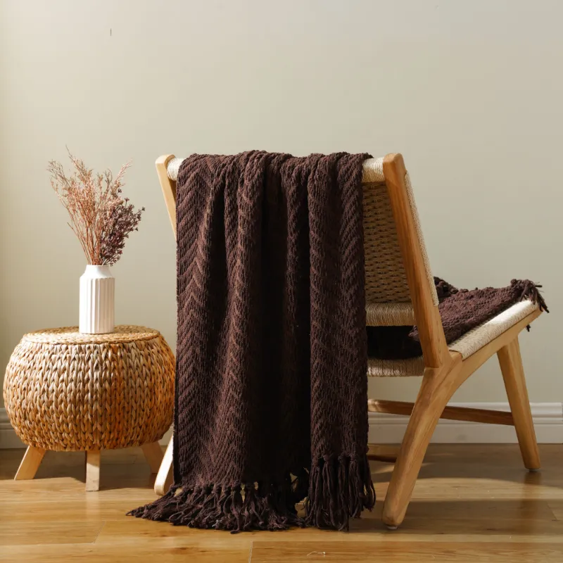 Battilo Home cotton throw blanket spread across a bed, lightweight fabric