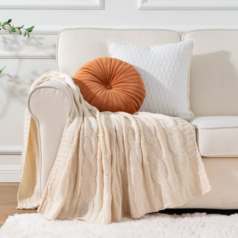 Battilo Home cable knit blanket with chunky braided pattern on display