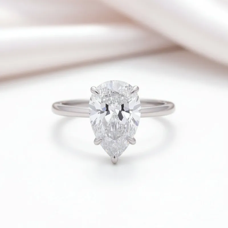 Black Diamonds New York pear cut engagement ring