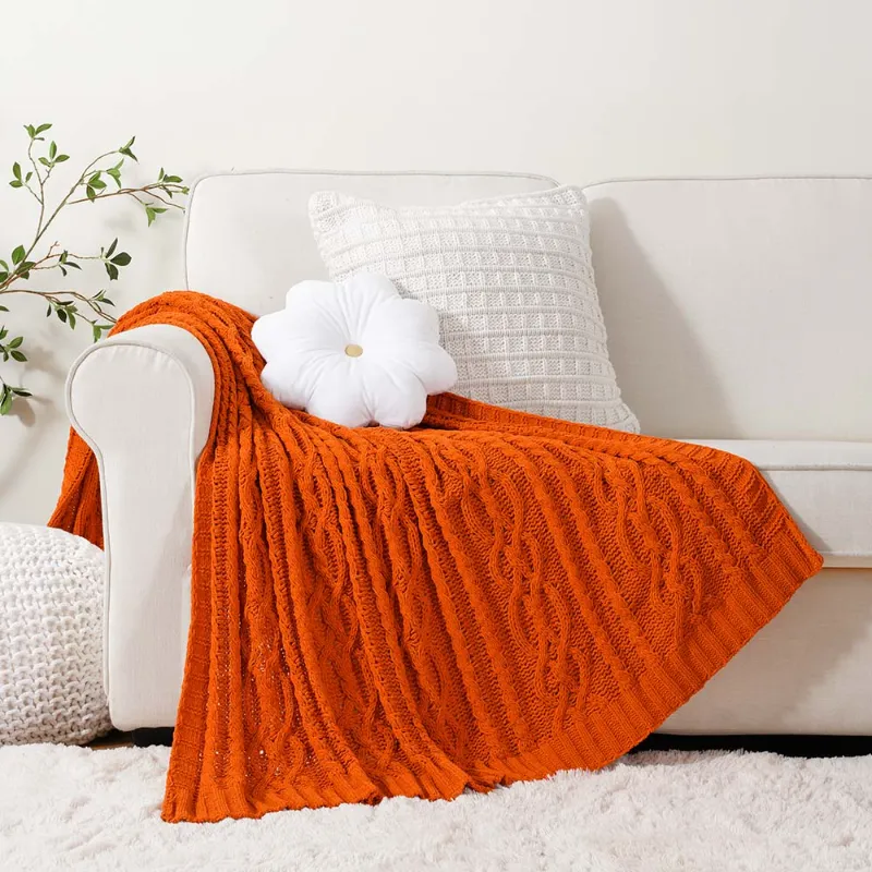 Battilo Home chenille blanket neatly folded, highlighting its ribbed weave