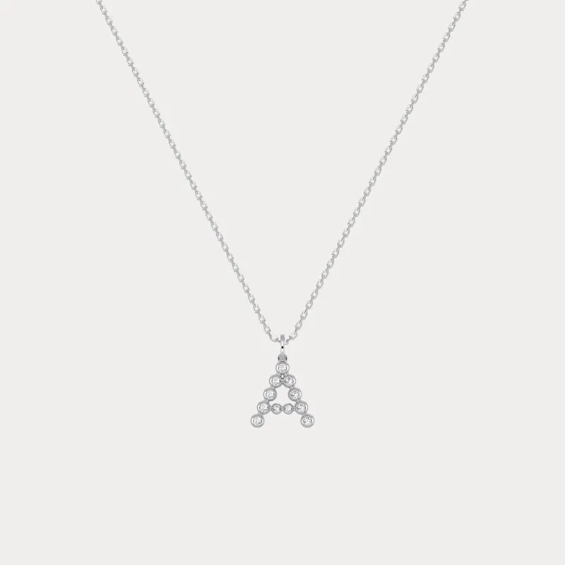 Leonids bubble initial necklace with a single raised letter charm on a fine chain
