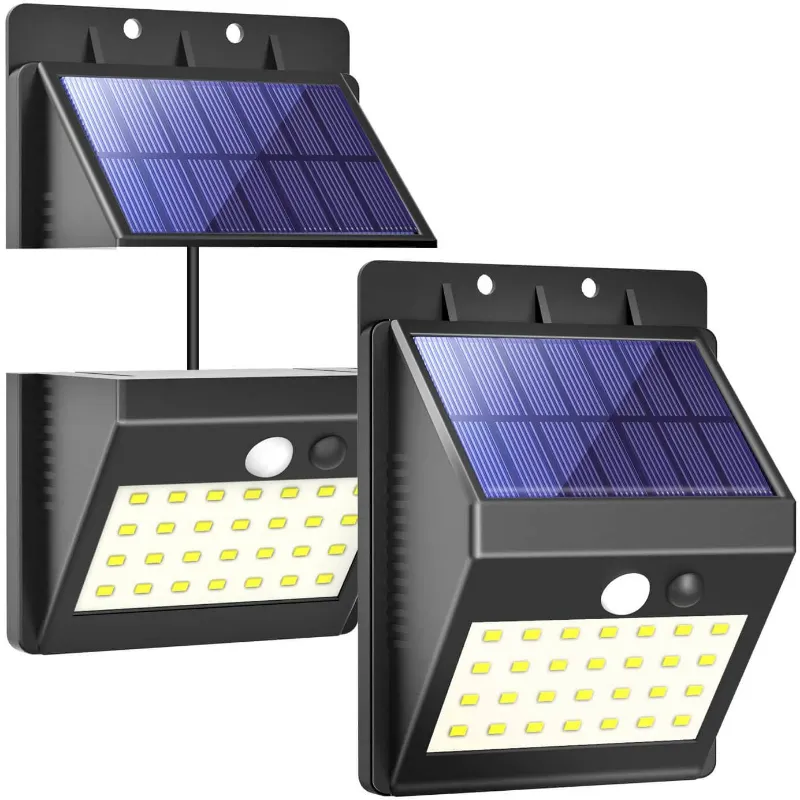 T SUN Lighting aloftsun solar motion sensor lights illuminating a dark driveway