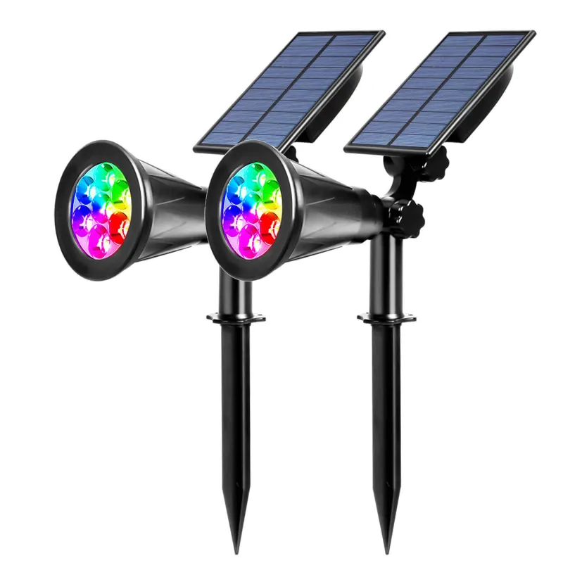 T SUN Lighting solar powered spot lights shining on a garden tree
